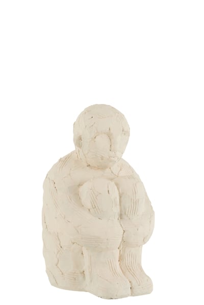 Personnage assis ciment blanc large