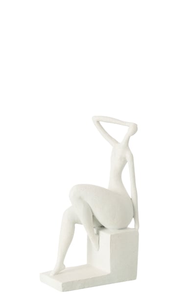 Femme assis sur carre resine mat blanc Femme assis sur carre resine mat blanc
