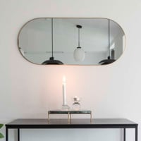 Miroir jersey ovale en laiton 35x80 cm